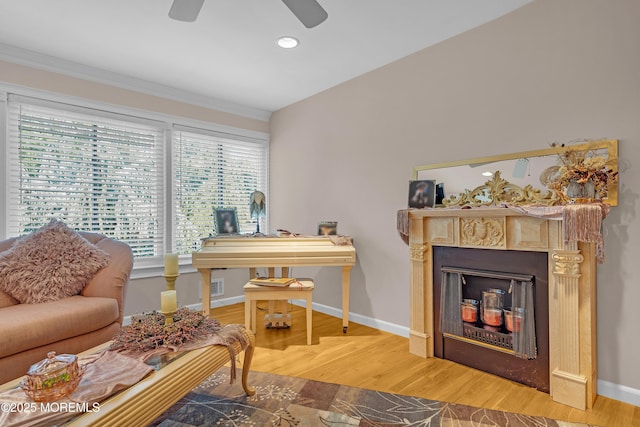 2 Apache Dr, Toms River, NJ 08753 - living area with ornamental molding, a ceiling fan, plenty of natural light, wood finished floors, and recessed lighting