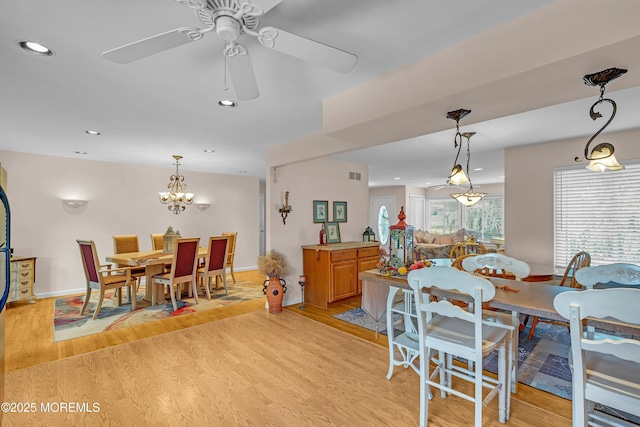2 Apache Dr, Toms River, NJ 08753 - dining space with light wood-style flooring, ceiling fan, recessed lighting, and a chandelier
