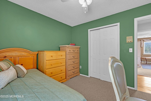 2 Apache Dr, Toms River, NJ 08753 - carpeted bedroom featuring a closet, ceiling fan, and a textured ceiling