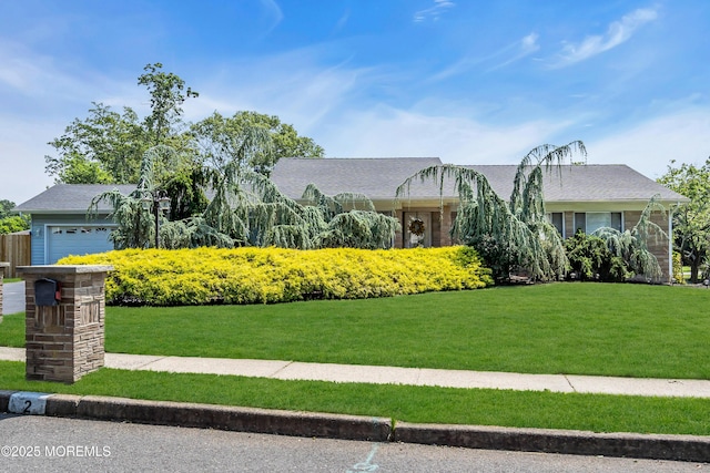 2 Apache Dr, Toms River, NJ 08753 - view of front facade with a front yard and a garage