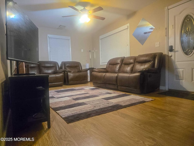 207 Delaware Ave, Cliffwood, NJ 07721 - living room featuring ceiling fan and wood finished floors