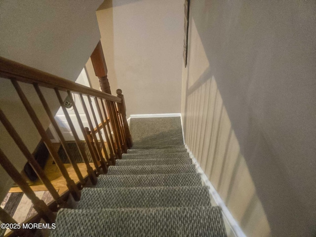 207 Delaware Ave, Cliffwood, NJ 07721 - staircase featuring carpet and baseboards