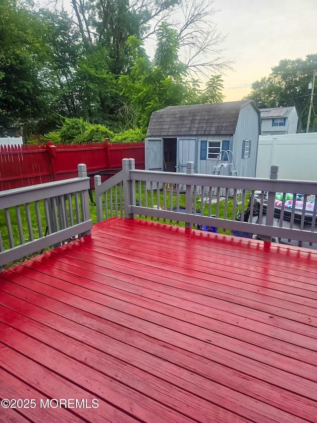 207 Delaware Ave, Cliffwood, NJ 07721 - wooden terrace with a storage unit and a fenced backyard