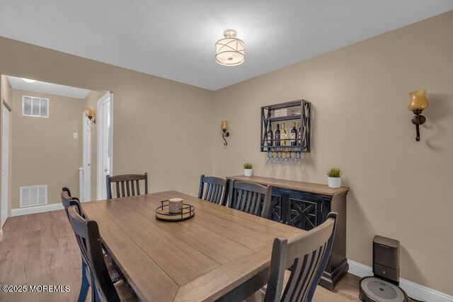 26 Kathy Ct, Brick, NJ 08724 - dining room featuring light wood-style floors and baseboards