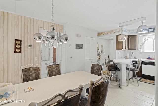 51 Hiering Ave Unit C 12, Seaside Heights, NJ 08751 - dining area with a chandelier, wooden walls, and light tile patterned floors