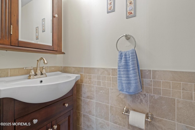 51 Hiering Ave Unit C 12, Seaside Heights, NJ 08751 - bathroom featuring vanity, tile walls, and wainscoting