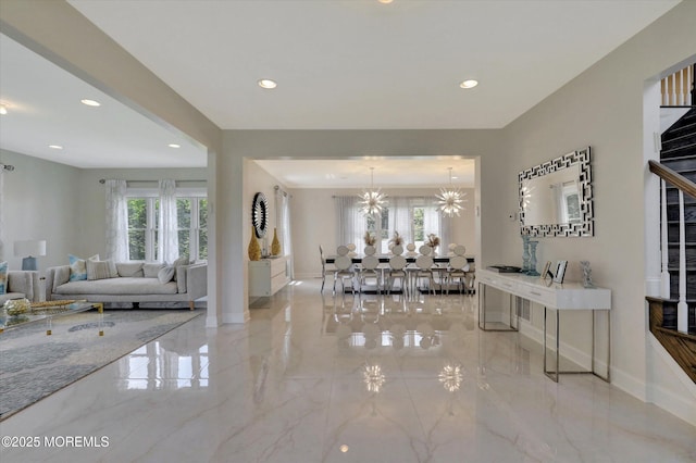 1 Country Club Dr, Deal, NJ 07723 - living room featuring marble tiled floors, recessed lighting, and a chandelier