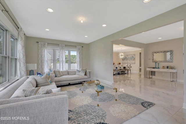 1 Country Club Dr, Deal, NJ 07723 - living room with marble tiled floors, recessed lighting, and a chandelier