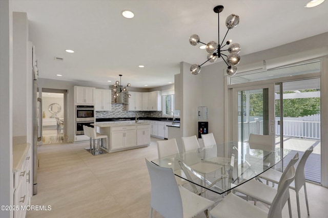 1 Country Club Dr, Deal, NJ 07723 - dining space featuring a chandelier, plenty of natural light, and recessed lighting