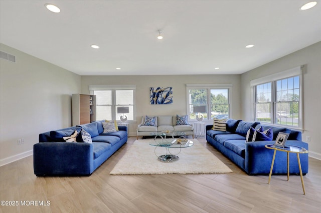 1 Country Club Dr, Deal, NJ 07723 - living room with wood finished floors, recessed lighting, and radiator