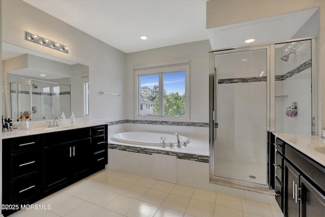 1 Country Club Dr, Deal, NJ 07723 - full bathroom featuring two vanities, a shower stall, a bath, and recessed lighting