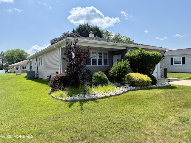 3 Tivoli St, Toms River, NJ 08757 - view of side of property featuring a chimney, a lawn, and a garage