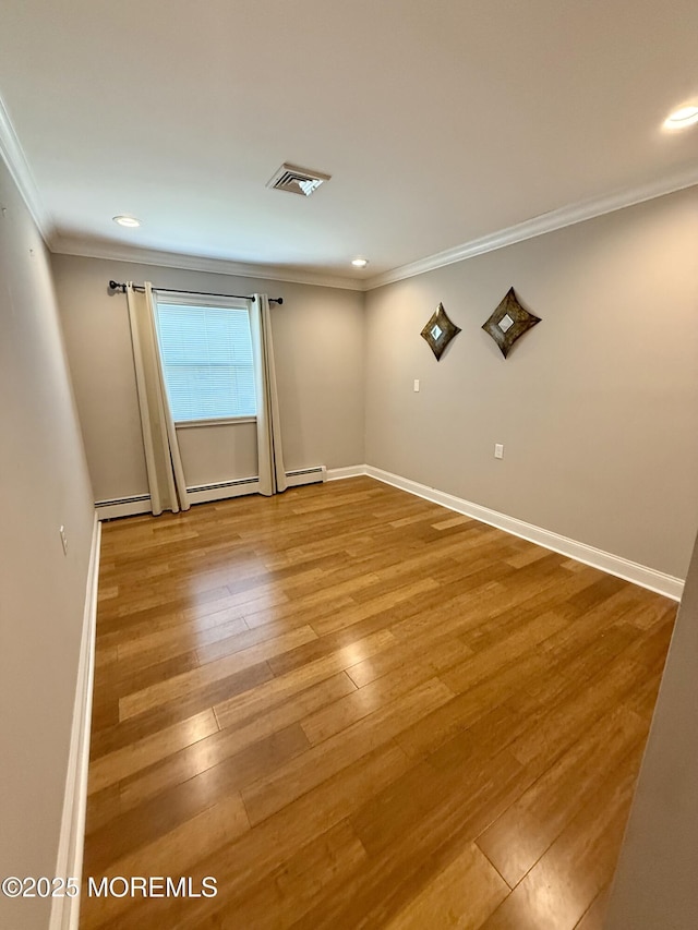 3 Tivoli St, Toms River, NJ 08757 - empty room featuring crown molding, wood finished floors, a baseboard heating unit, and recessed lighting
