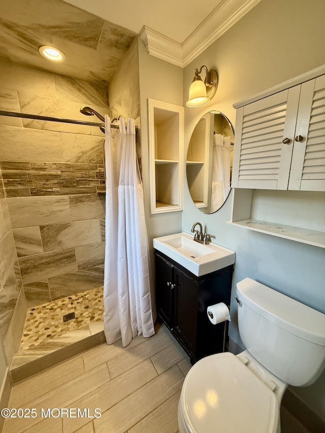 3 Tivoli St, Toms River, NJ 08757 - bathroom with ornamental molding, vanity, tiled shower, and wood tiled floors
