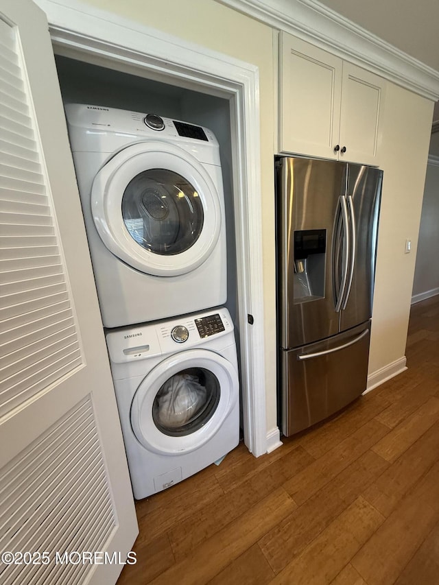 3 Tivoli St, Toms River, NJ 08757 - washroom with estacked washer and dryer and dark wood-style flooring