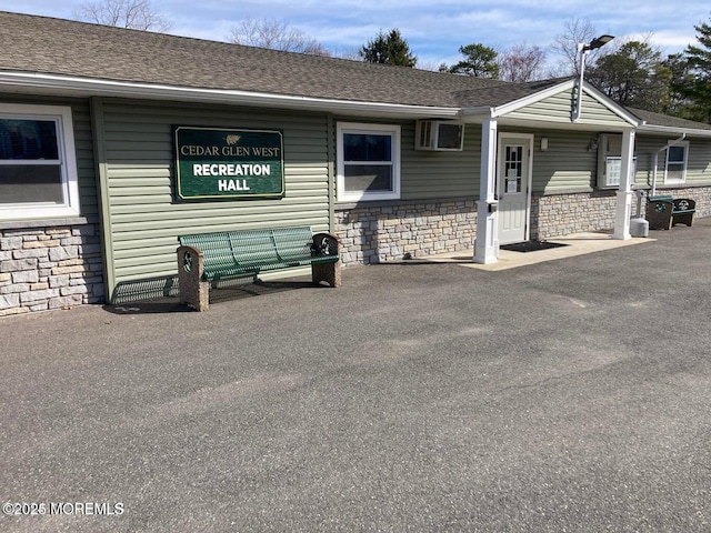 16A Mallard St, Manchester, NJ 08759 - view of property exterior featuring stone siding and roof with shingles