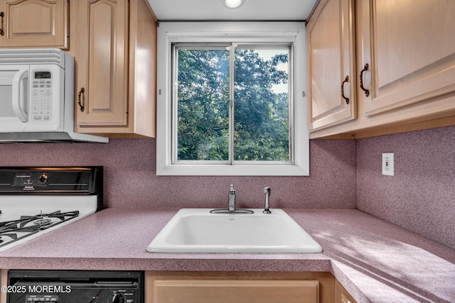 16A Mallard St, Manchester, NJ 08759 - kitchen with white appliances, light brown cabinetry, and light countertops