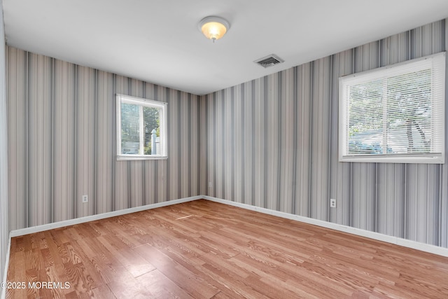 16A Mallard St, Manchester, NJ 08759 - spare room featuring wood finished floors and wallpapered walls