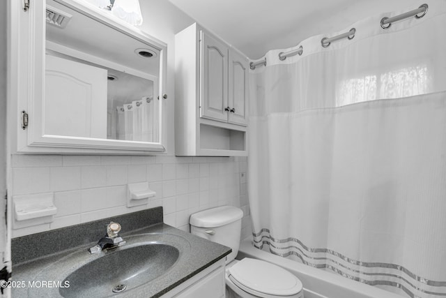16A Mallard St, Manchester, NJ 08759 - bathroom featuring vanity, tasteful backsplash, shower / bath combo with shower curtain, and tile walls