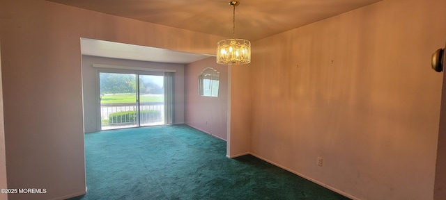 23 Primrose Ln, Brick, NJ 08724 - spare room featuring dark carpet and a chandelier