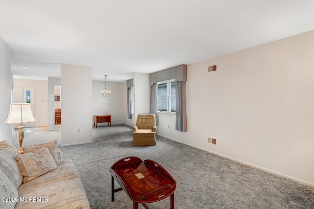 231 Valley Forge Dr, Little Egg Harbor, NJ 08087 - living area featuring carpet and a chandelier