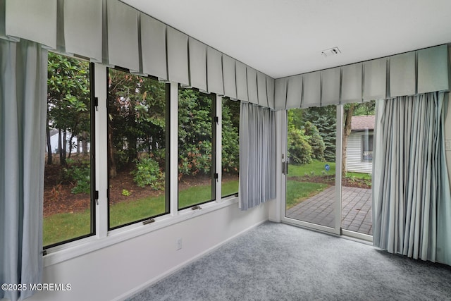231 Valley Forge Dr, Little Egg Harbor, NJ 08087 - unfurnished sunroom with baseboards and carpet floors