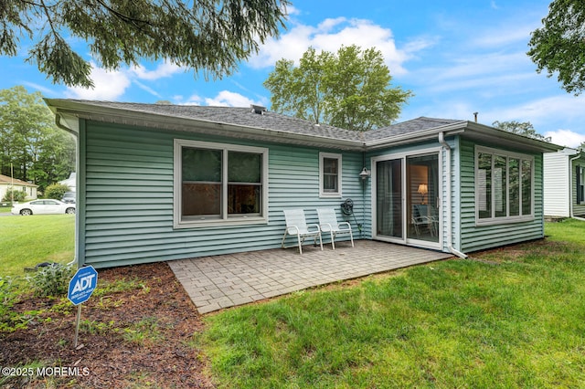 231 Valley Forge Dr, Little Egg Harbor, NJ 08087 - rear view of house featuring a patio, a lawn, and roof with shingles