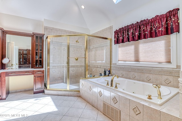 2 Red Oak, Holmdel, NJ 07733 - bathroom with tile patterned flooring, a whirlpool tub, a shower stall, vaulted ceiling, and a skylight