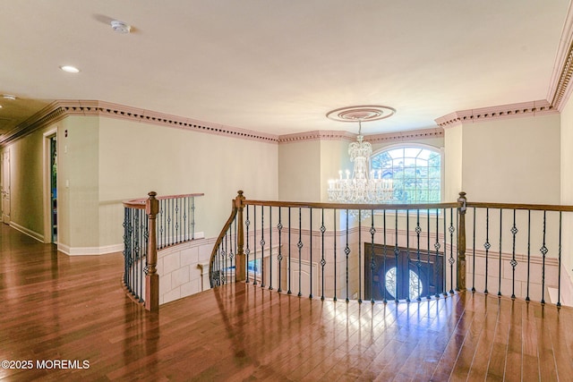 2 Red Oak, Holmdel, NJ 07733 - hallway with a chandelier, wood finished floors, an upstairs landing, recessed lighting, and crown molding