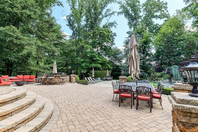2 Red Oak, Holmdel, NJ 07733 - view of patio with outdoor dining space, view of scattered trees, an outdoor living space, and a pool