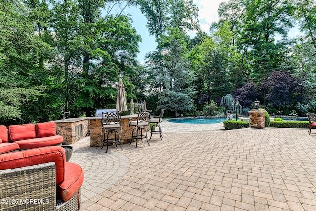 2 Red Oak, Holmdel, NJ 07733 - view of patio / terrace with an outdoor pool and view of scattered trees