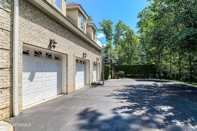 2 Red Oak, Holmdel, NJ 07733 - garage featuring driveway