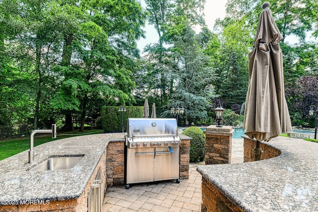 2 Red Oak, Holmdel, NJ 07733 - view of patio featuring an outdoor kitchen and view of scattered trees