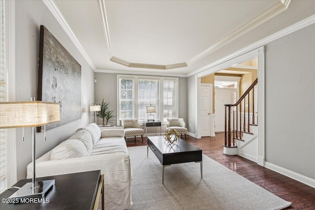 24 Rutledge Rd, Marlboro, NJ 07746 - living room with a raised ceiling, wood finished floors, ornamental molding, and stairway
