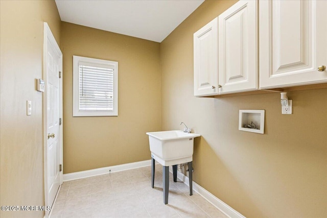 24 Rutledge Rd, Marlboro, NJ 07746 - laundry area with cabinet space, hookup for a washing machine, and light tile patterned flooring