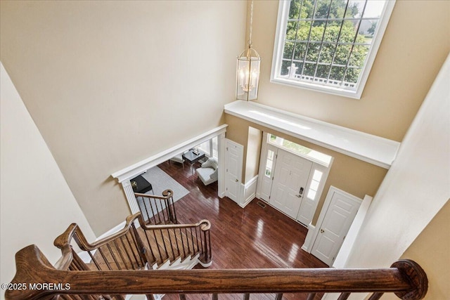 24 Rutledge Rd, Marlboro, NJ 07746 - entrance foyer featuring a high ceiling, healthy amount of natural light, and wood finished floors