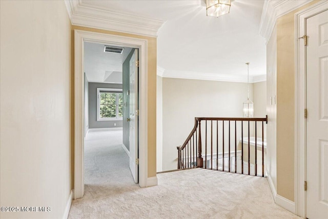 24 Rutledge Rd, Marlboro, NJ 07746 - hall featuring an upstairs landing, carpet flooring, ornamental molding, and a chandelier