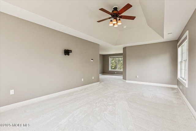 24 Rutledge Rd, Marlboro, NJ 07746 - spare room with ceiling fan, a tray ceiling, and light colored carpet