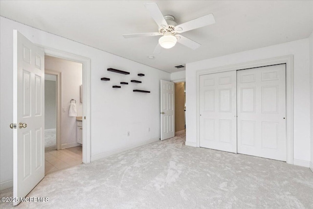 24 Rutledge Rd, Marlboro, NJ 07746 - unfurnished bedroom with carpet floors, a closet, ceiling fan, and ensuite bathroom