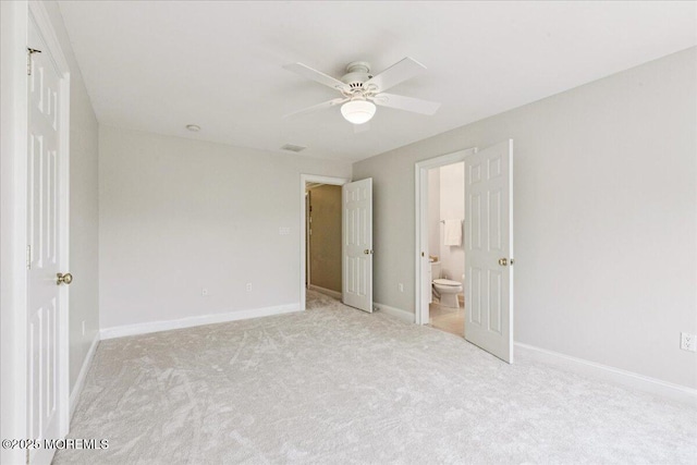 24 Rutledge Rd, Marlboro, NJ 07746 - unfurnished bedroom featuring light carpet, ensuite bath, and a ceiling fan