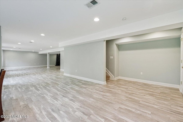 24 Rutledge Rd, Marlboro, NJ 07746 - finished below grade area featuring light wood-type flooring, recessed lighting, and stairs