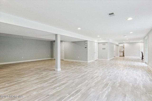 24 Rutledge Rd, Marlboro, NJ 07746 - finished below grade area featuring light wood-style flooring and recessed lighting