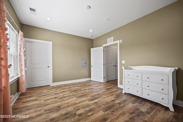 518 Tavern Rd, Monroe, NJ 08831 - unfurnished bedroom with dark wood-type flooring, electric panel, and recessed lighting