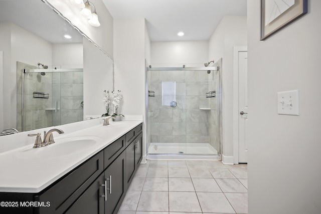 518 Tavern Rd, Monroe, NJ 08831 - full bathroom with double vanity, tile patterned flooring, a shower stall, and recessed lighting