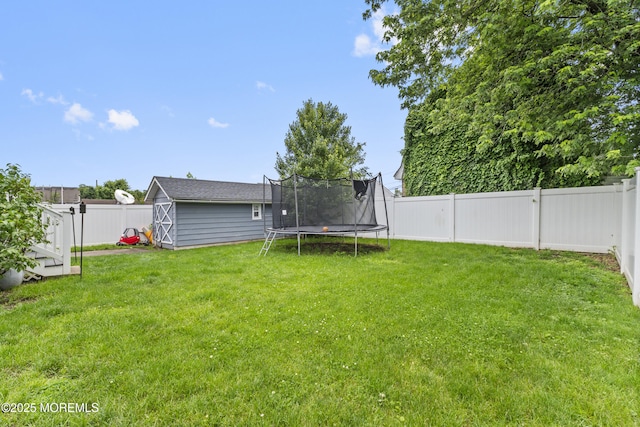 81 Lockwood Ave, Woodbridge, NJ 07095 - fenced backyard with a trampoline and a shed
