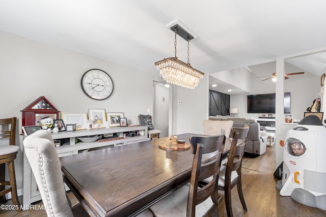 81 Lockwood Ave, Woodbridge, NJ 07095 - dining space featuring hardwood / wood-style flooring, a ceiling fan, and a chandelier