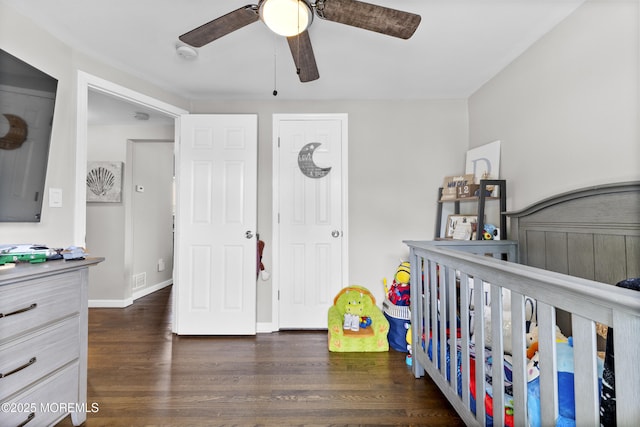81 Lockwood Ave, Woodbridge, NJ 07095 - bedroom with a nursery area, dark wood-style floors, and ceiling fan