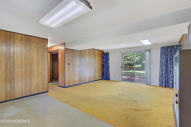 16 Burdge Dr, Howell, NJ 07731 - unfurnished bedroom featuring wooden walls, access to outside, and light flooring