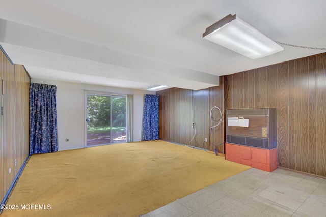 16 Burdge Dr, Howell, NJ 07731 - living area featuring heating unit, wood walls, and light floors
