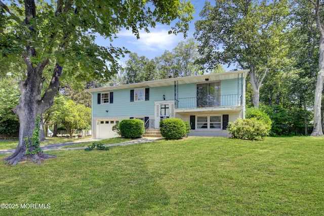 16 Burdge Dr, Howell, NJ 07731 - view of front of property featuring an attached garage, driveway, a front lawn, and a balcony